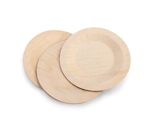 Eco-friendly wooden disposable cutlery. Round plates on white background