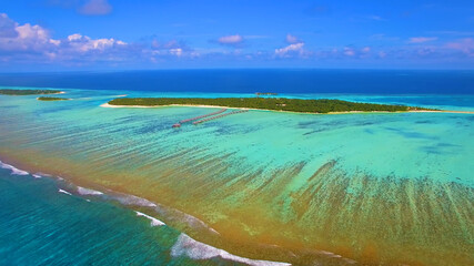 Shooting from an airplane, island in the Maldives, sandbank, coral reef