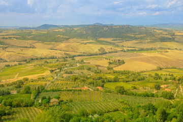 Fototapeta na wymiar Aerial landscape on the terraced vineyards of Tuscany winegrowing village Montepulciano in Tuscan-Emilian apennines. Italian countryside and famous for Rosso wine of Tuscany region in Italy.