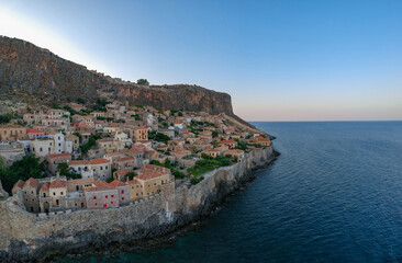 Naklejka na ściany i meble Aerial view of the old medieval castle town of Monemvasia in Lakonia of Peloponnese, Greece. Monemvasia is often called The Greek Gibraltar.