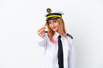 Airplane pilot over isolated white background making money gesture