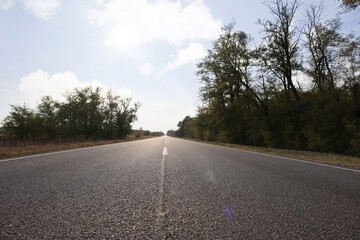 View of asphalt road without transport in countryside