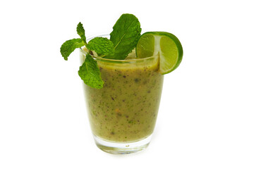 Glass of green kiwi smoothie decorated with mint and lime isolated at white background. Natural superfood. Healthy lifestyle.