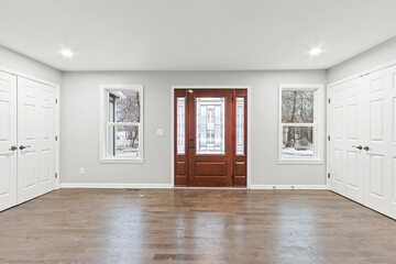 Luxury mansion double doors with designed glass panes