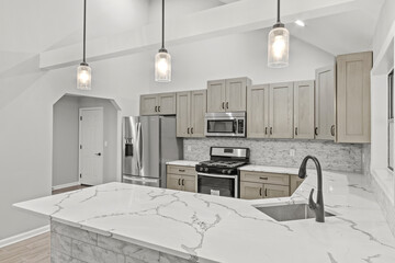 Luxury mansion kitchen with hanging lights fridge and stove