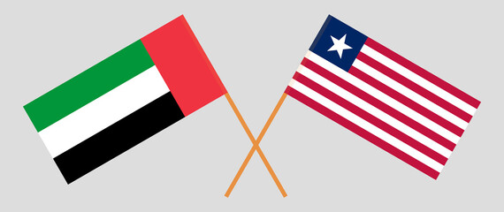 Crossed flags of the United Arab Emirates and Liberia. Official colors. Correct proportion