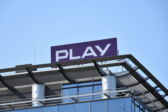 Play company sign, logo, symbol on the facede of popular Polish provider of telecommunication, mobile and internet services. WARSAW, POLAND - SEPTEMBER 12, 2020