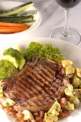  Rib Steak with mushroom, tomato and broccoli salad 