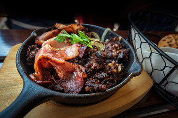 Close up of Kaszanka, Polish delicacy made from pork meat often also organ meat, barley or buckwheat and pig’s blood. Its also known as kiszka or krupniok, Polish cuisine with meat