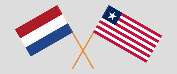 Crossed flags of the Netherlands and Liberia. Official colors. Correct proportion