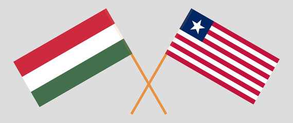 Crossed flags of Hungary and Liberia. Official colors. Correct proportion