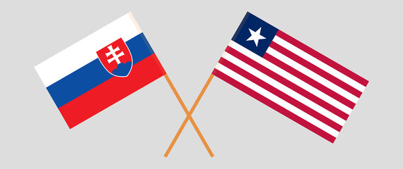Crossed flags of Slovakia and Liberia. Official colors. Correct proportion