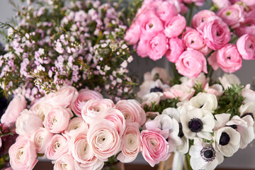 Set of white, pink and magenta flowers for Interior decorations. The work of the florist at a flower shop. Fresh cut flower.
