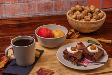 Autumn breakfast with coffee cake nuts and fruits