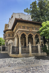 Fototapeta premium Stavropoleos Church (Biserica Stavropoleos) or Stavropoleos Monastery founded by the Greek monk Ioanichie - one of the oldest churches in Bucharest (1724). Bucharest, Romania.