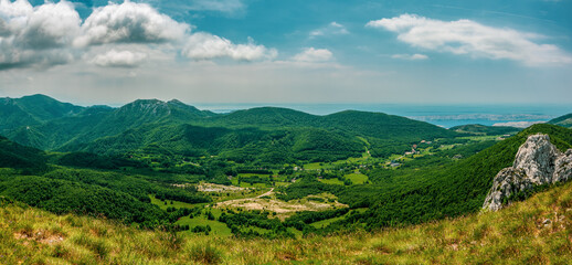 Fototapeta na wymiar Panorama of Baske Ostarije village, Dabarski kuk, Velebit Nature Park, Croatia.