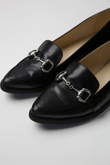 Black leather handmade loafers, studio shot