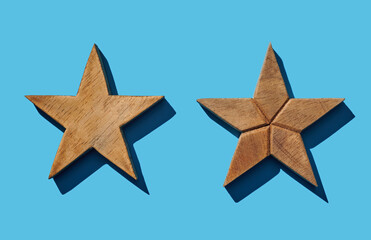 Star shaped wooden box on blue pastel background