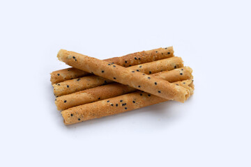Crispy egg rolls on white background.