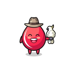 blood drop zookeeper mascot with a parrot