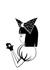 girl in mittens holding a snowflake