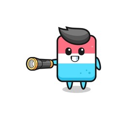 eraser mascot holding flashlight