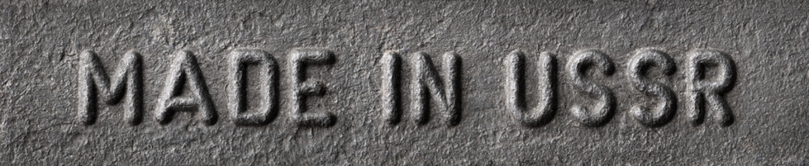Made in USSR inscription with metallic letters on the metal plate