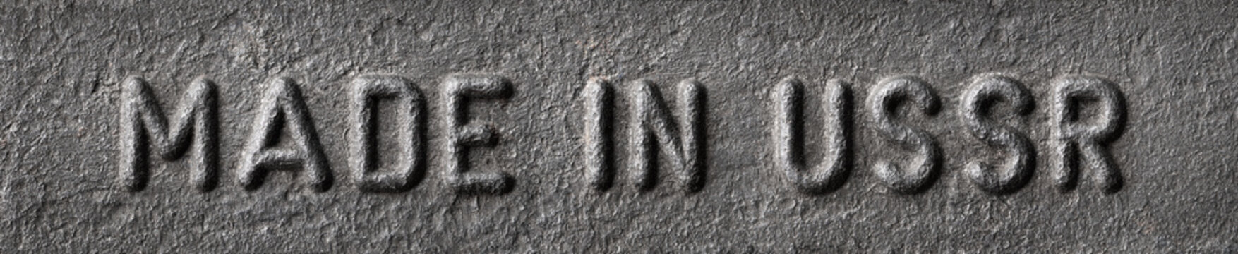 Made in USSR inscription with metallic letters on the metal plate