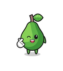 avocado character doing Korean finger heart