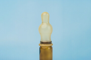 Baby pacifier on small bottle close up. Used for feeding baby and administering medications.