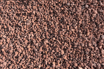 Slag  Coal Burnt out, Texture heap top view. Nature rock Red Background spent coal.