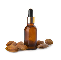 Bottle of almond essential oil on white background