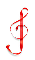 Violin clef made of red ribbon on white background