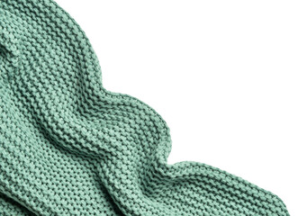 Crumpled knitted plaid on white background