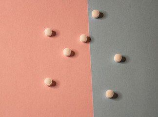 Pills in pastel background