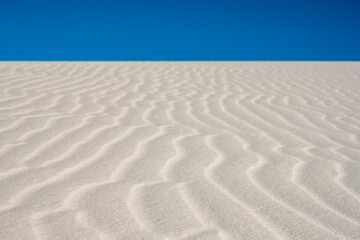 Fototapeta na wymiar Wiggly Waves of White Sand Dunes