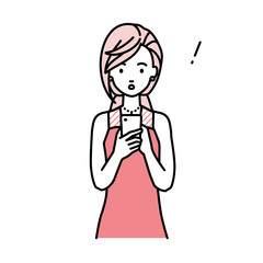 立ってスマートフォンを操作して何かに気づいて驚いたドレスの女性