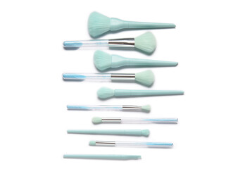 Set of beautiful makeup brushes on white background