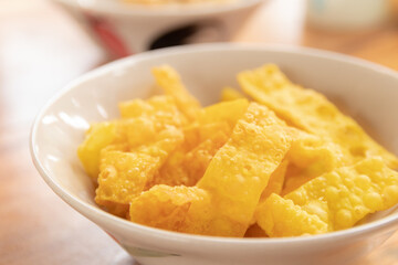 close-up of fried wonton sheet in the bowl