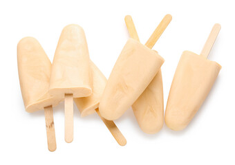 Tasty melon popsicles on white background