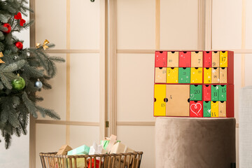 Advent calendar on pouf in living room