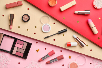 Fototapeta na wymiar Makeup cosmetics with Christmas decor on color background