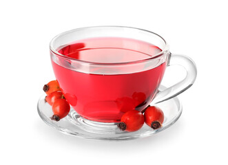 Glass cup of tasty rose hip tea and berries on white background