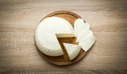 cheese on wooden background