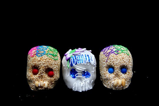 Candy in the shape of a skull made of sugar and amaranth to decorate the offering with candles for the Day of the Faithful Dead and all the saints that is celebrated in Mexico

