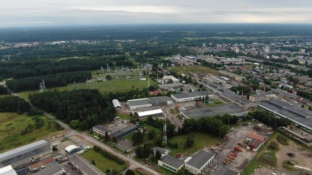 Industrial side of Jonava city, aerial fast pan right view