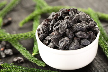 Bowl of sun dried organic black raisins.