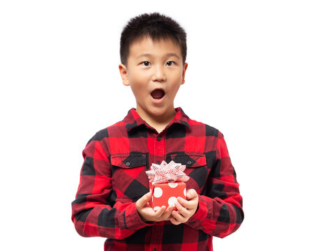 Surprised Kid With Hand Holding Christmas Gift Box Isolated On White Background