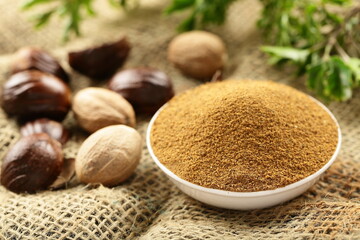 Bowl of Organic nutmeg powder, garam masala, Indian spices.