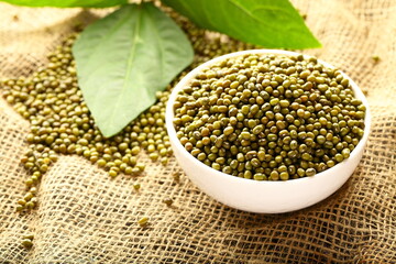 Bowl of organic mung beans, Asian vegan diet foods.